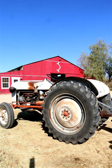 hay tractor parked   barn tractors park