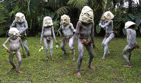 Mud Men Of Papua New Guinea Pictured In Their Clay Masks