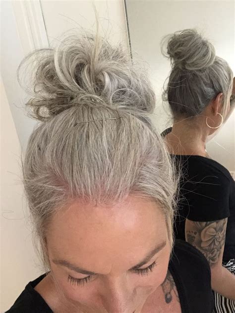 messy grey bun silver hair beautiful gray hair