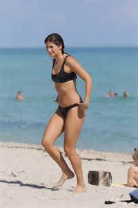 lucy aragon in bikini does yoga on the beach in miami