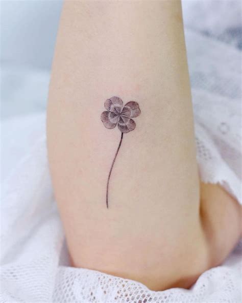 small  leaf clover tattoo   ankle   petals
