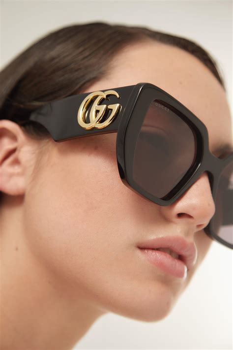 gucci gg0956s oversized black sunglasses with maxi logo lyst uk