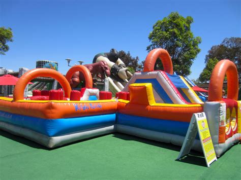 inflatable world lets kids jump   climb huge inflatables family vacation hub