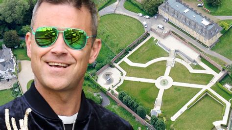 robbie williams in planning row with parish council over new fence at £