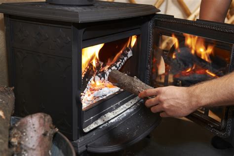 clean  wood burning stove glass door chimney