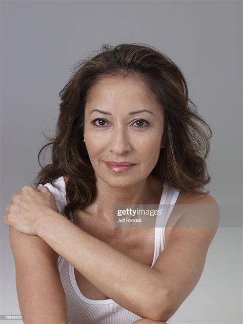 mature woman smiling portrait high res stock photo getty images