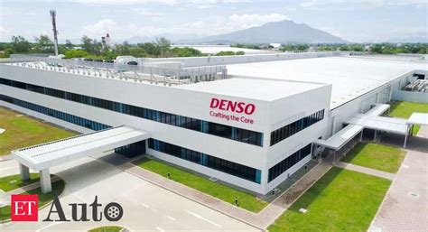 denso global production toyota supplier denso halves output  virus  profit hits  year