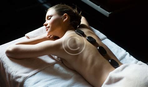 heat things up this winter with hot stone massage vedica