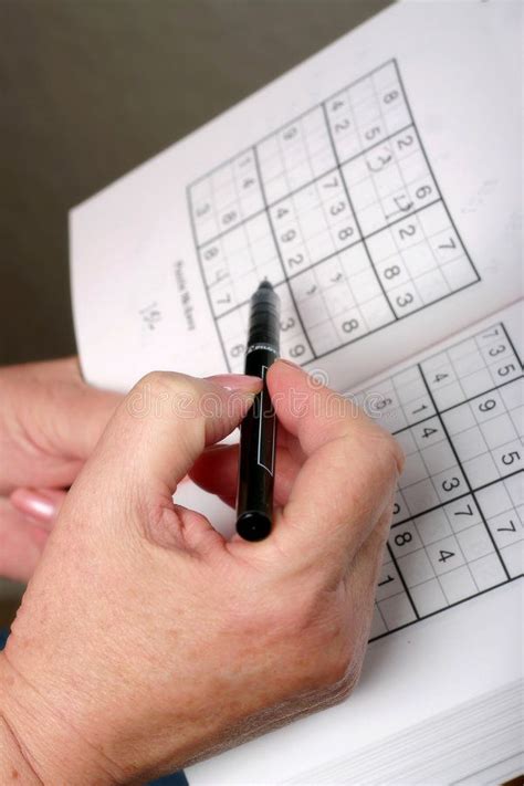 sudoku woman figuring   sudoku puzzle affiliate woman sudoku figuring puzzle