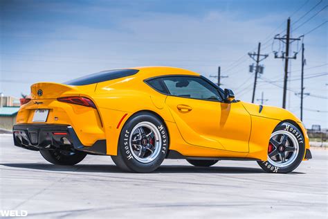 toyota supra nitro yellow yellow  supra weld wheels