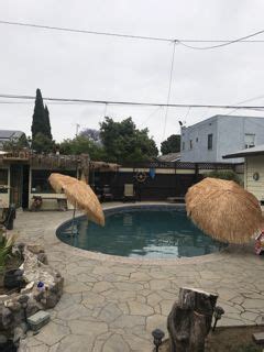 vintage remodeled backyard wtiki bar pool pond rent