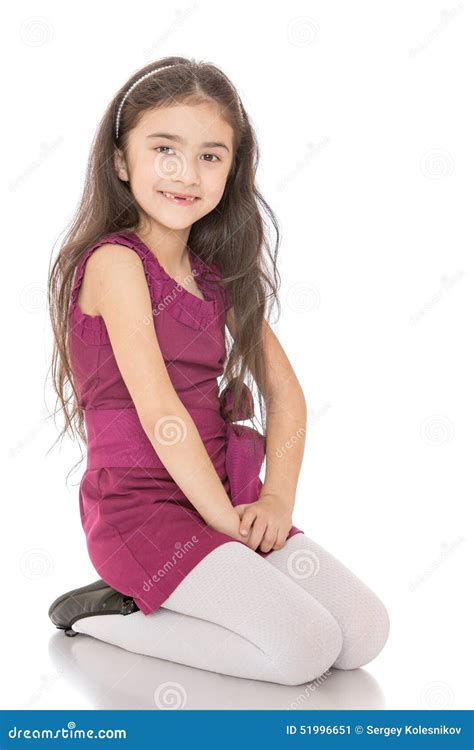 Joyful Dark Haired Girl In Purple Dress Sitting On Stock Image Image