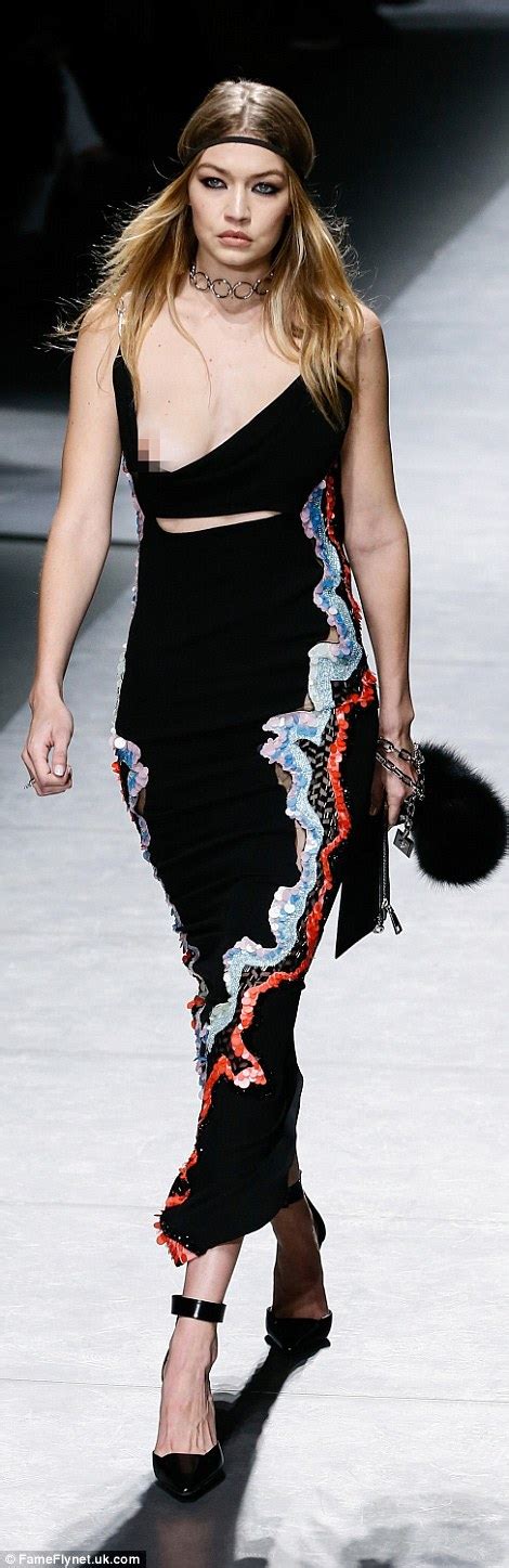 Gigi Hadid Suffers A Nip Slip On The Runway For Versace At Milan