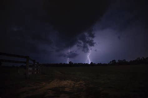 lightning strike  ground  night time  stock photo