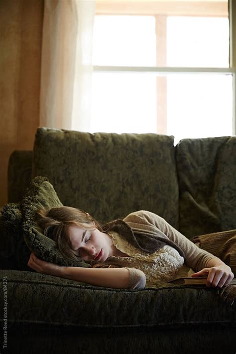 Woman Sleeping On Sofa In Living Room By Trinette Reed Stocksy United