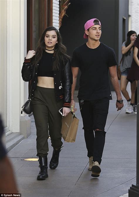 hailee steinfeld flashes her mid riff with handsome male pal daily mail online