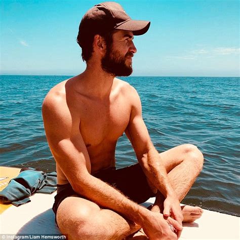 Shirtless Liam Hemsworth Soaks Up The Sunshine In