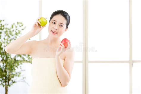 beautiful asian girl  towel  fresh apple spa stock photo image
