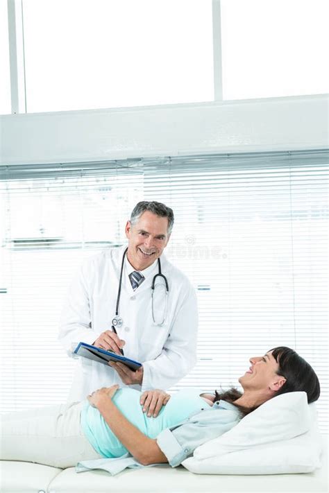 Doctor Examining A Pregnant Woman Stock Image Image Of Doctor Health