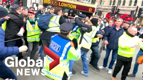scuffles break   pro brexit yellow vest rally  central london youtube