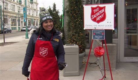bell ringers support salvation army s red kettle campaign