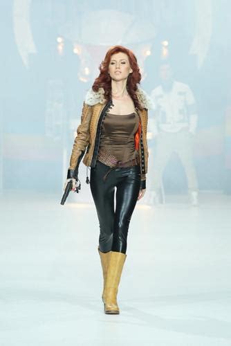 photos russian spy anna chapman works the runway with pistol