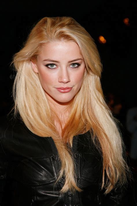 have you heard about amber heard 14 stunning photos of johnny depp s