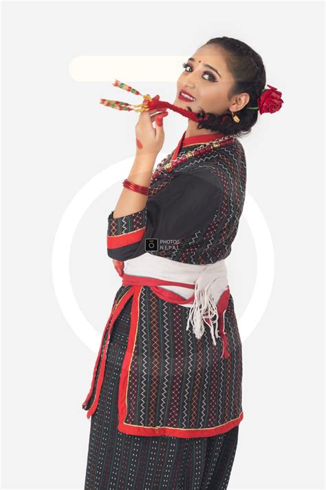 A Cute Newari Girl With A Traditional Newari Outfit Poses For Camera