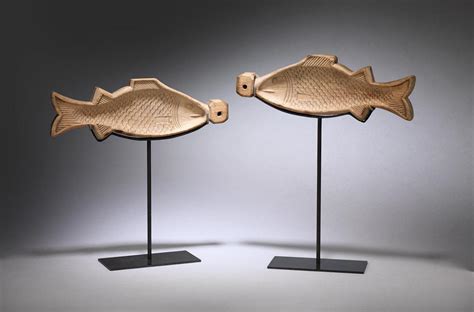 pair  fish form moulds british antique dealers association