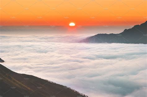 sunrise  mountains clouds aerial nature stock  creative