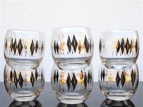 1960s roly poly drink glasses black and gold argyle diamond