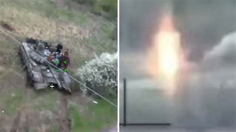 incredible pov video shows ukrainian kamikaze drone smashing  russian tank  fireball blast