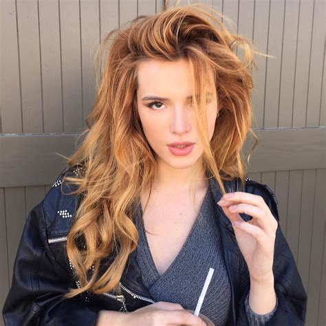 bella thorne posts christmas instagram in red lingerie and santa hat