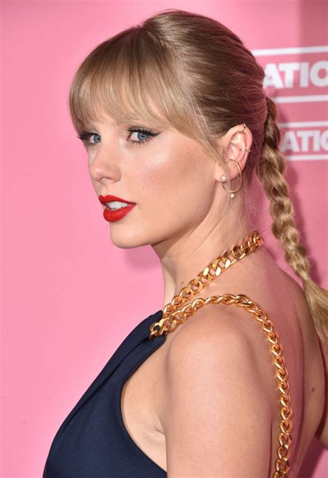 Taylor Swift Goes Demure In Navy Jumpsuit At The 2019