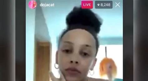 Doja Cat Explains How Her Wigs Have Messed Up Her Hairline Responding