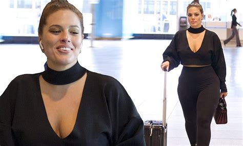 ashley graham shows off her cleavage in a plunging top