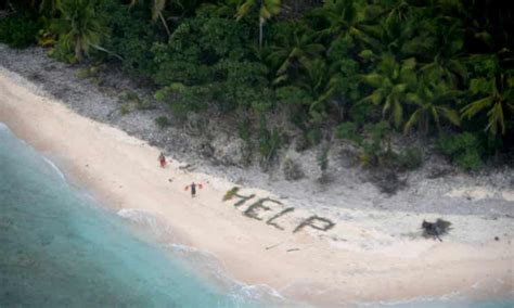 three men rescued from deserted island after spelling help with palm