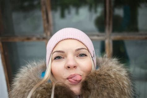 Pretty Blonde Woman Selfie Close Up Portrait In Winter City Park