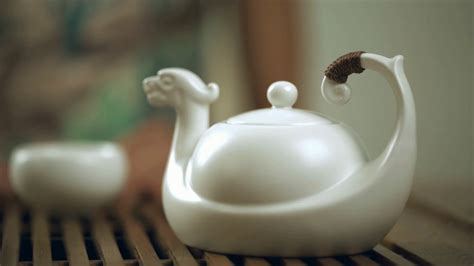 woman hand pour tea  teapot  teacup stock footage sbv
