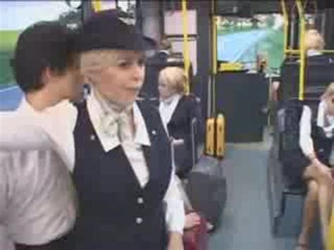 busty german hostess giving handjob in the bus