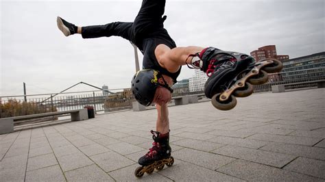 man roller skates using his hands youtube