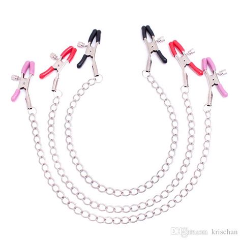 unisex pink coated clothes pin style nipple clamps with chain sex flirt