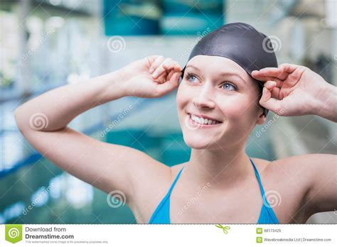 Pretty Woman Putting On Swim Cap Stock Image Image Of Pool Athletic