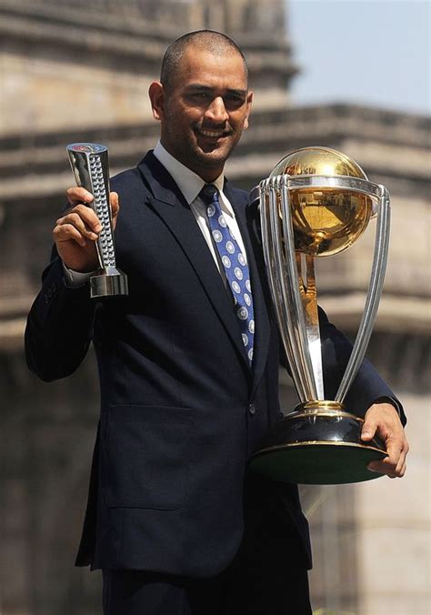 you can download ms dhoni with trophies hd images here ms dhoni with
