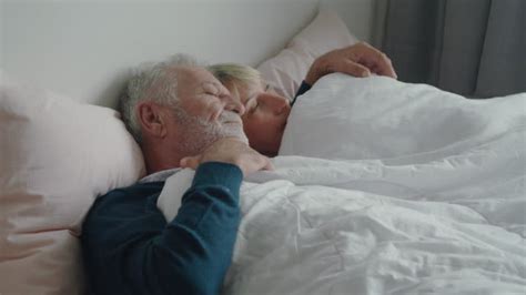 old couple in bed stock videos and royalty free footage istock
