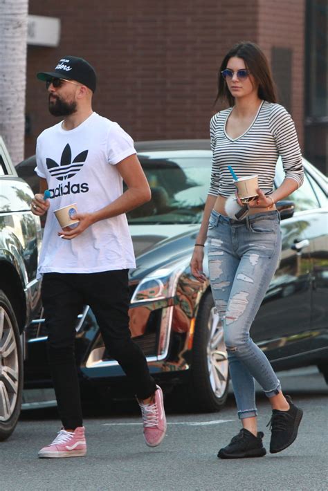 kendall jenner booty in tight ripped jeans out in beverly hills