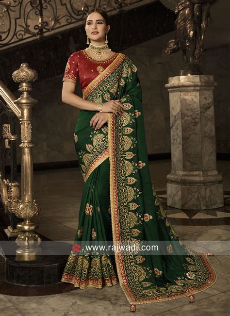 Green Heavy Saree With Red Blouse