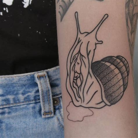 Snail Pussy Tattoo On The Inner Forearm
