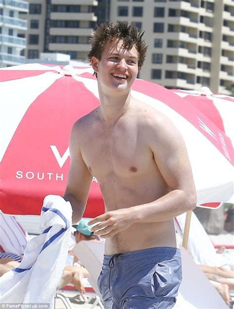 ansel elgort has baywatch moment as he runs shirtless after miami beach swim daily mail online