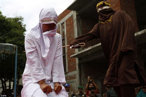 kachi zone s blog sharia law indonesian woman caned in public for